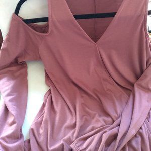 Pink wrap blouse with shoulder cutouts